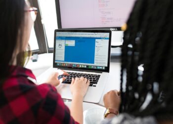 woman using MacBook Pro